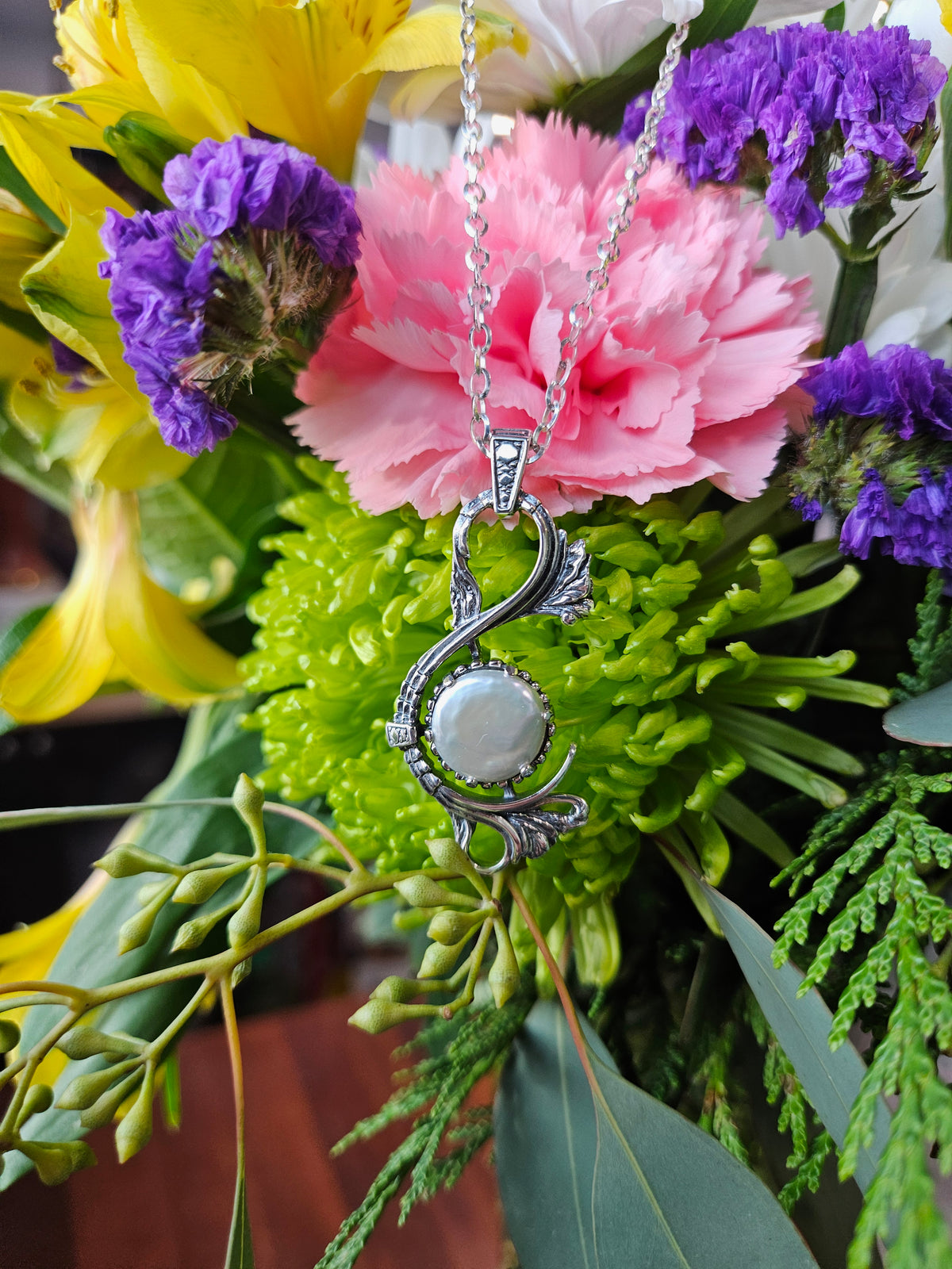 Sterling and pearl Victorian pendant on 25" sterling triangular rolo chain with lobster clasp